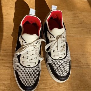 Men’s black and white Louboutin sneakers. US11